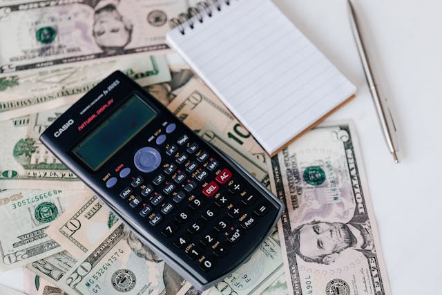 calculator-and-cash-on-a-table